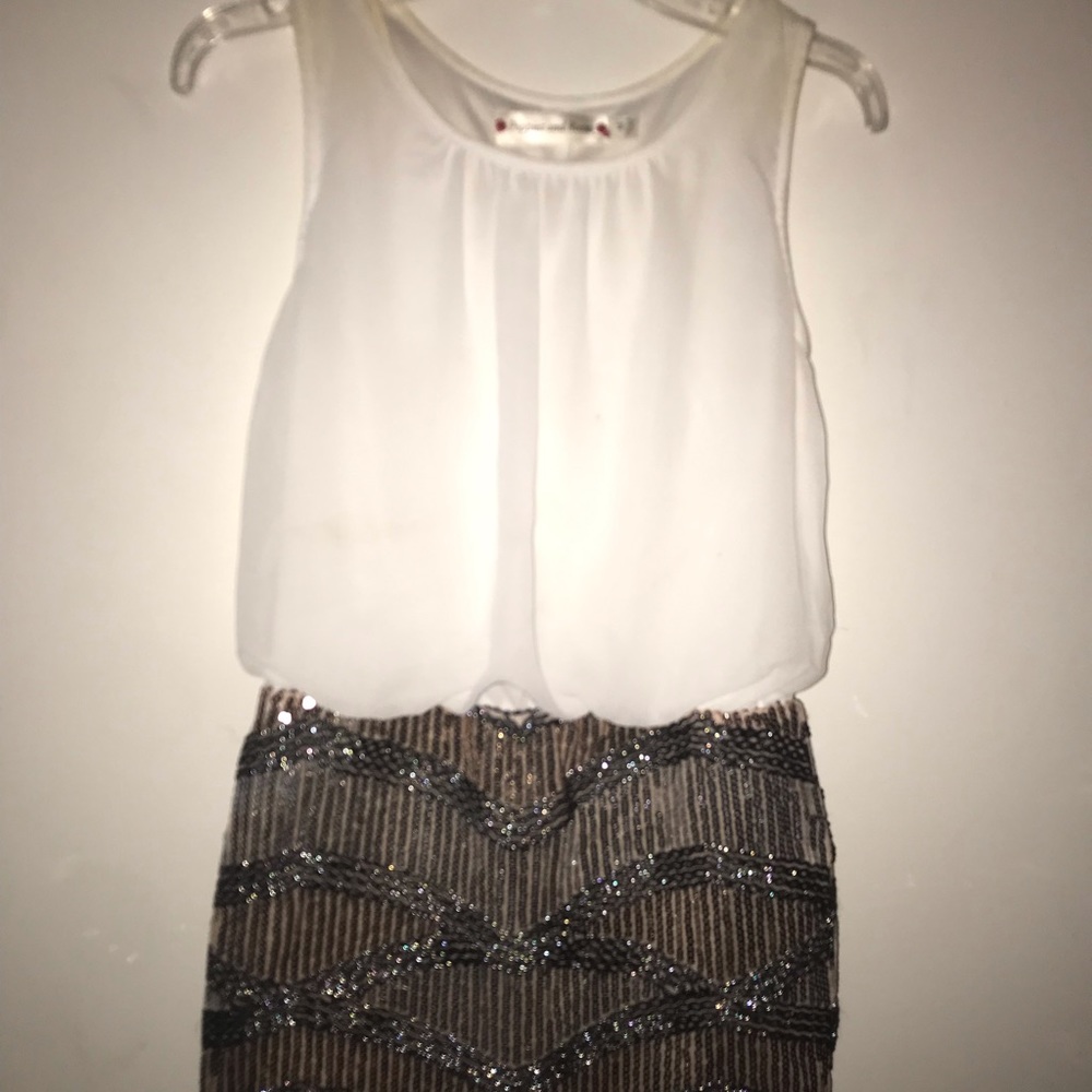 White, Gold, and Black Dress